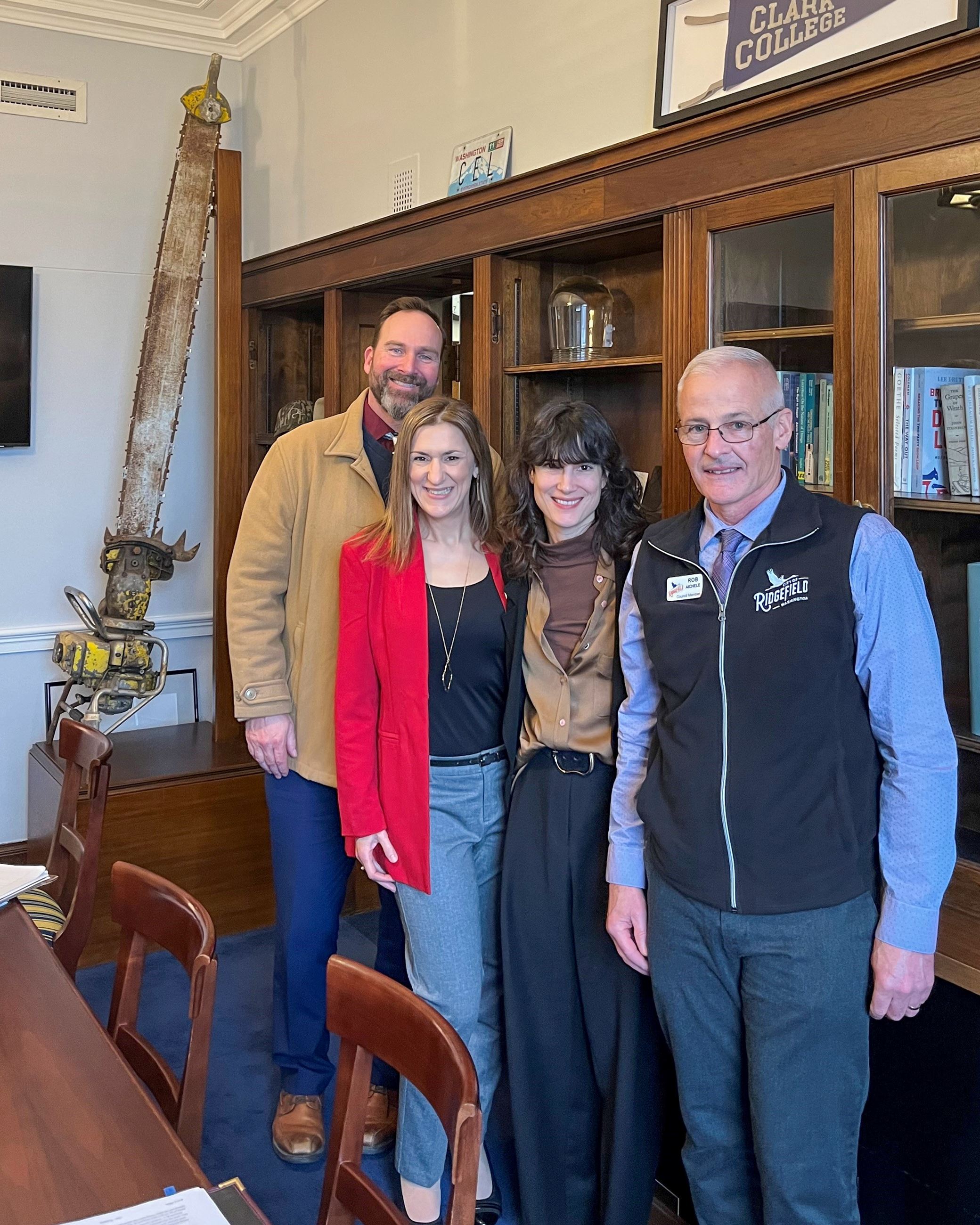 Steve Stuart, Jennifer Lindsay, and Rob Aichele pose with Rep. Gluesenkamp Perez in her DC office.