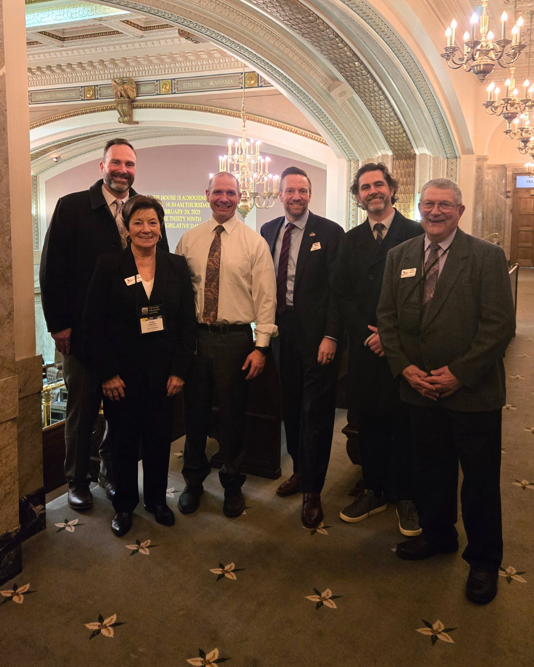 City councilmembers pose with District 20 Representative Peter Abbarno.
